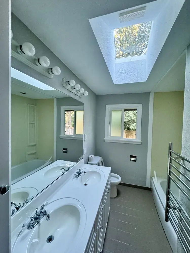 Bathroom interior painting in Bothell - professional wall painting with skylight