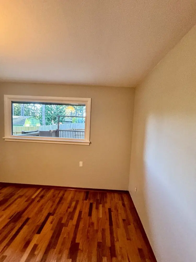 Bedroom interior painting in Bothell home - neutral wall colors for home staging