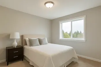 Professional bedroom painting in Kirkland showing calm neutral colors and quality finishes