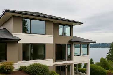 Contemporary Bellevue waterfront home with professional exterior painting and lake view