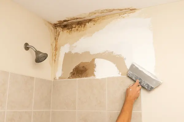 Water damage repair in Everett bathroom with professional patching