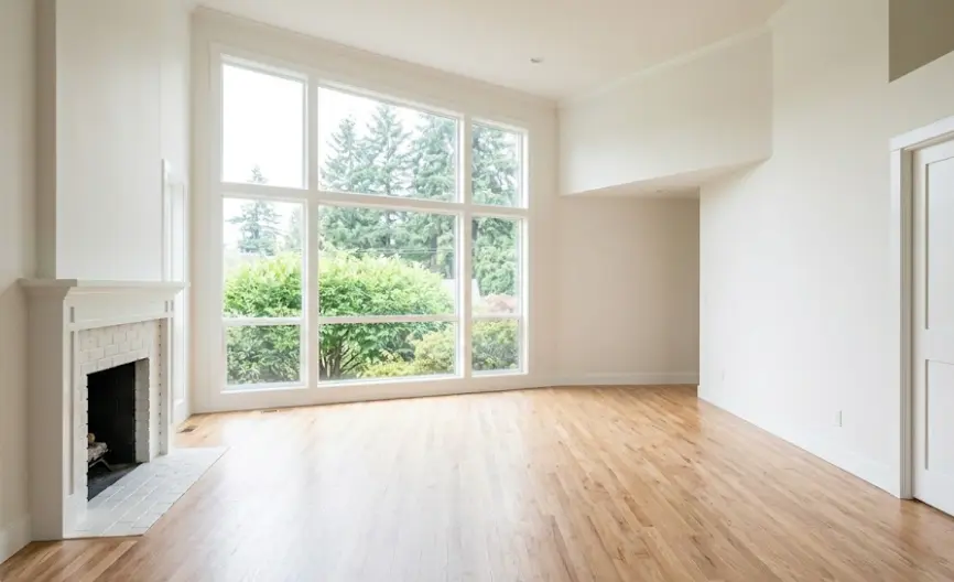 Complete interior repaint of Kirkland craftsman home showing plaster wall preparation and consistent eggshell finish result