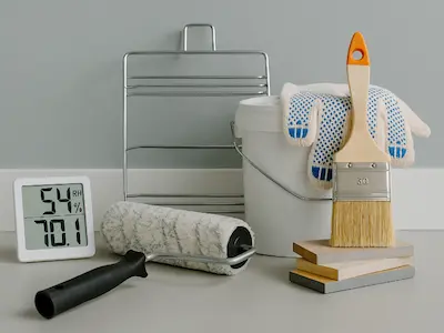 Specialized painting process for Seattle humidity showing professional equipment and techniques