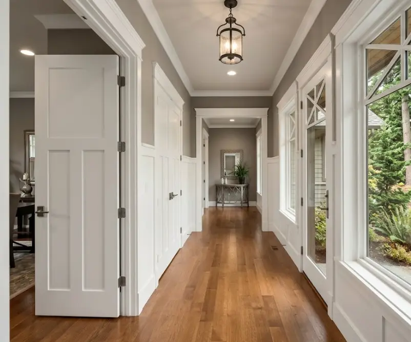 Freshly painted white craftsman trim and window casings in Woodinville home — Sherwin-Williams Emerald Urethane